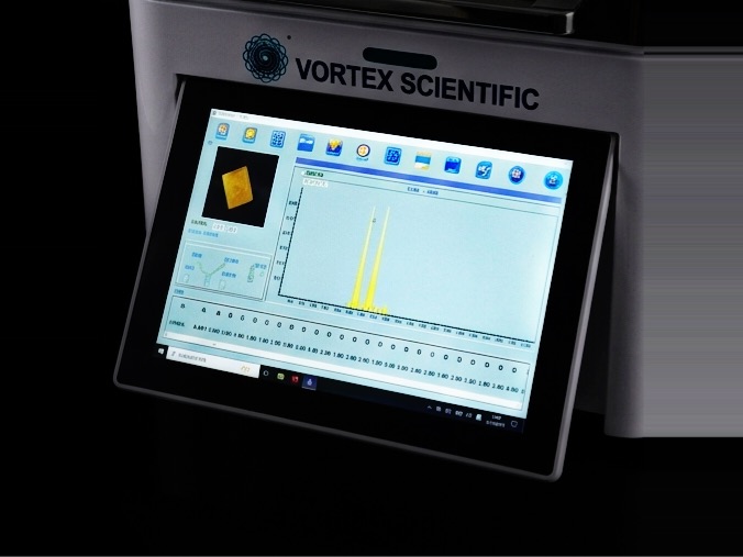 Close-up of the FalconX-6k touchscreen showing the analysis software with a measured spectrum and the sample image